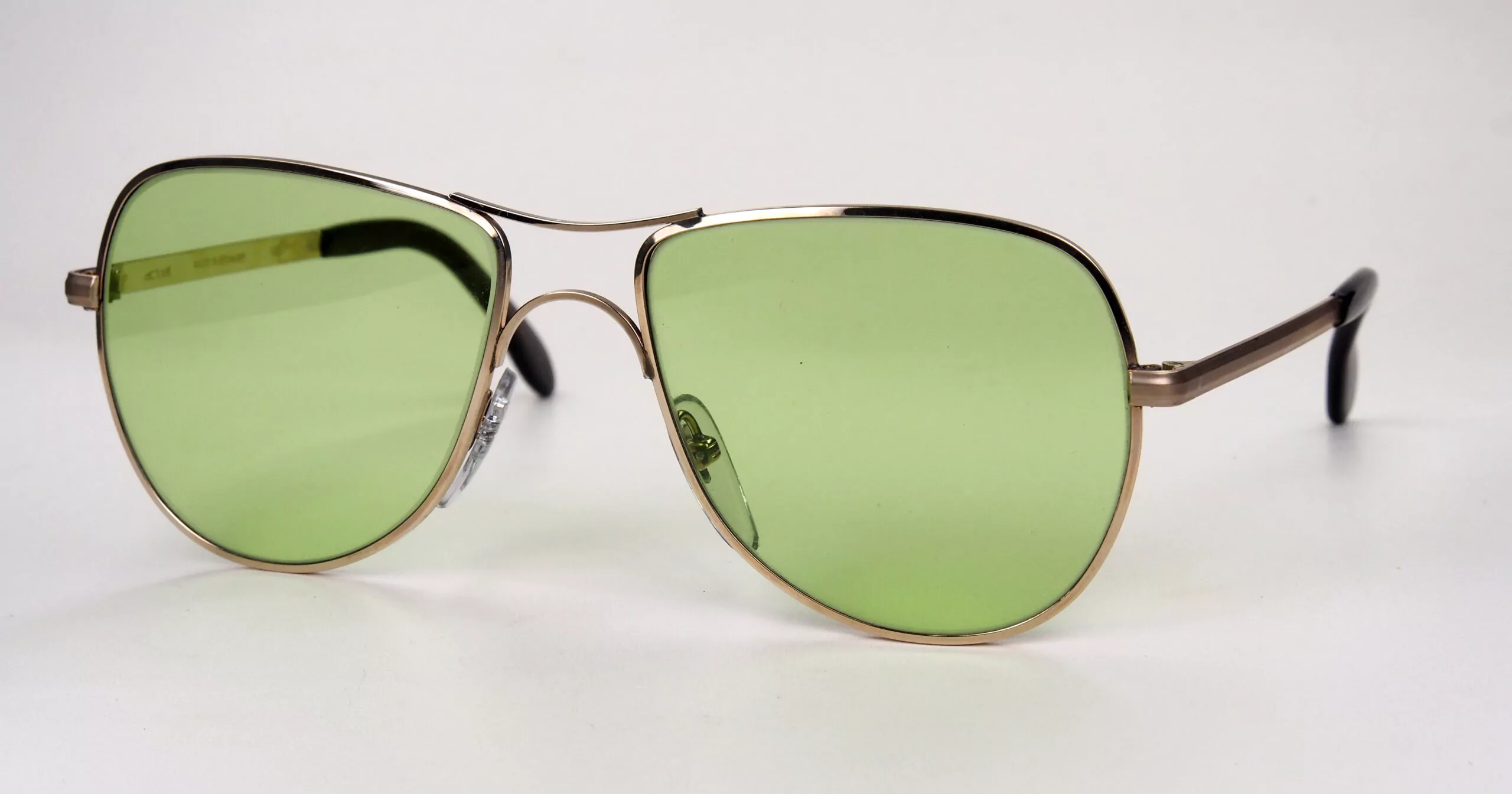 Vintage Sonnenbrille aus den 80er Jahren gold, hellgrüne Gläser